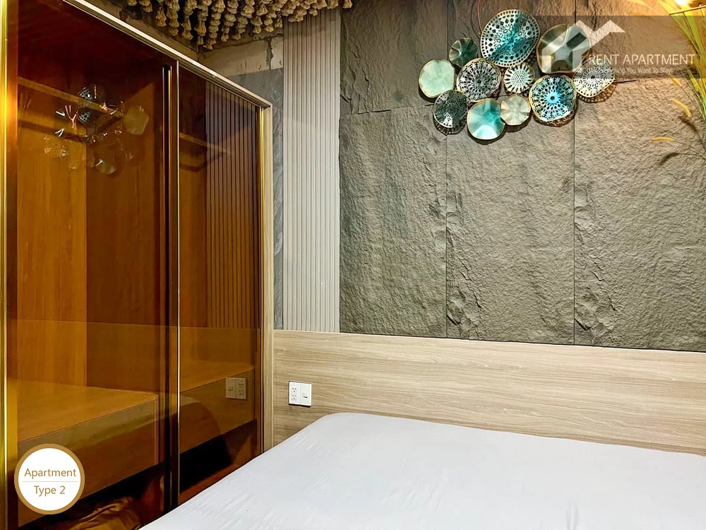 La Rosa 1-Bed bedroom interior with built in glass wardrobe and headboard lighting