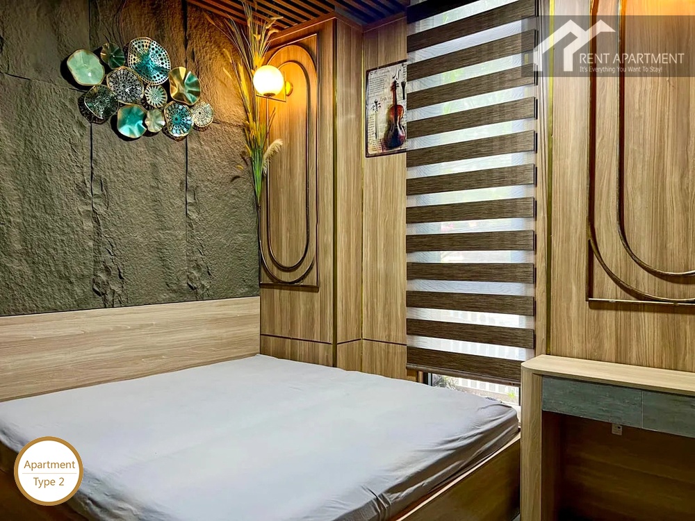 La Rosa 1-Bed cozy bedroom with double bed stone feature wall and window blind
