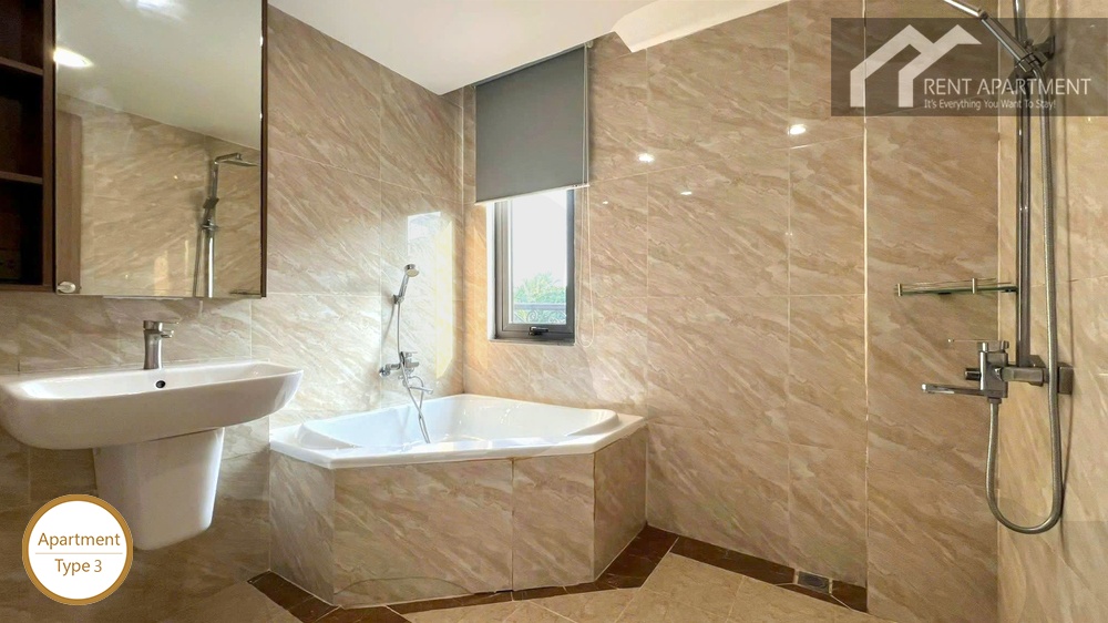 La Rosa 2-Bed master en-suite bathroom with corner soaking tub and walk-in shower