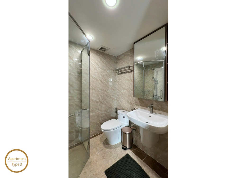 La Rosa 2-Bed modern bathroom with vanity sink toilet and glass shower cabin