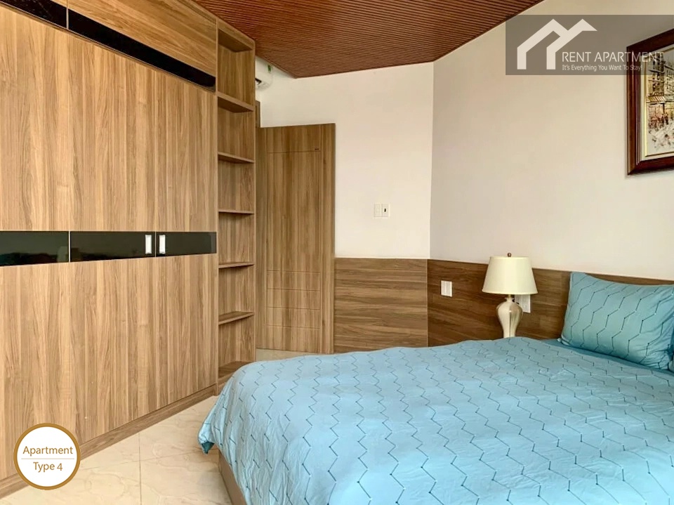 La Rosa 3-Bed master bedroom with wooden wardrobe shelving and en-suite entrance