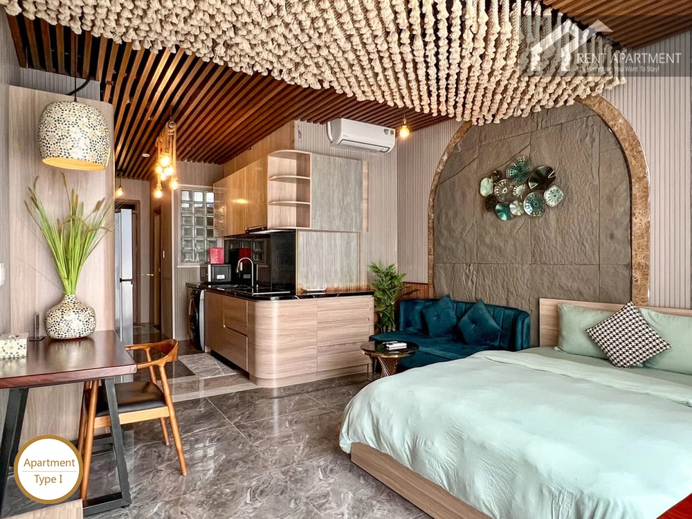 La Rosa Studio open studio space with double bed dining table and wooden kitchenette
