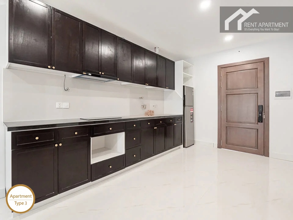 ID 2030 type 3 linear kitchen with dark wood cabinets black countertop and built-in appliances
