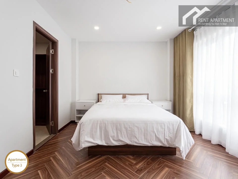 ID 2030 type 3 master bedroom with double bed herringbone wood flooring and window curtains