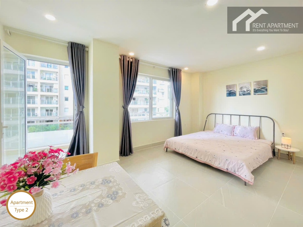 ID 2031 type 2 bright bedroom space with double bed large windows and balcony door access