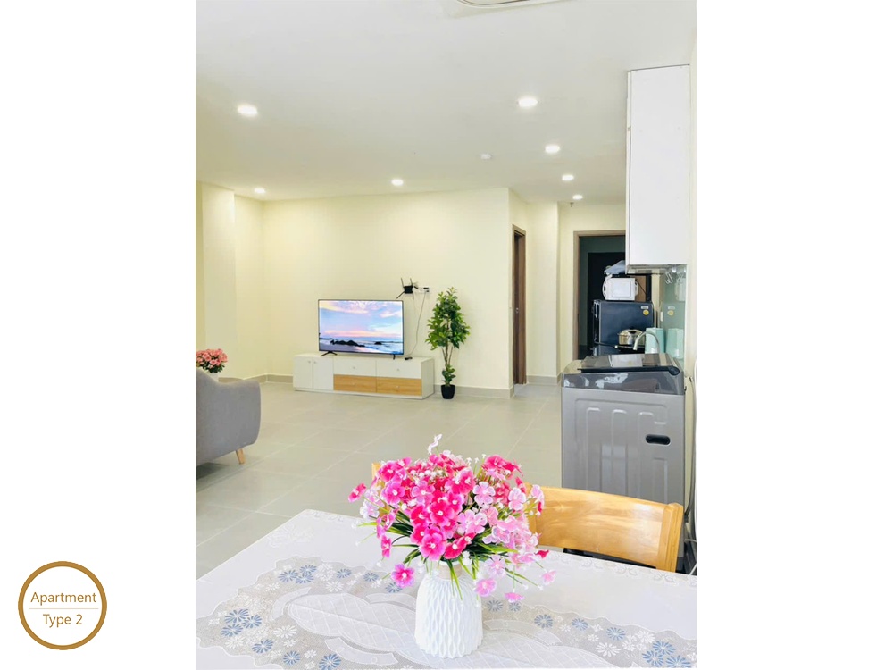 ID 2031 type 2 dining table view looking towards tv console washing machine and kitchen