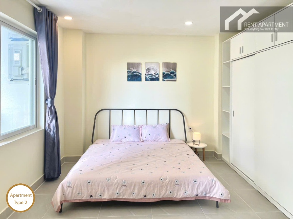 ID 2031 type 2 sleeping area with double bed wall art window curtain and large white wardrobe