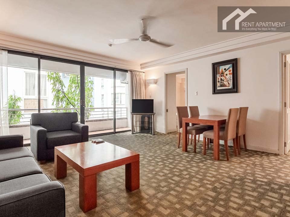 ID 2054 spacious living room with sofa set coffee table dining area and balcony access