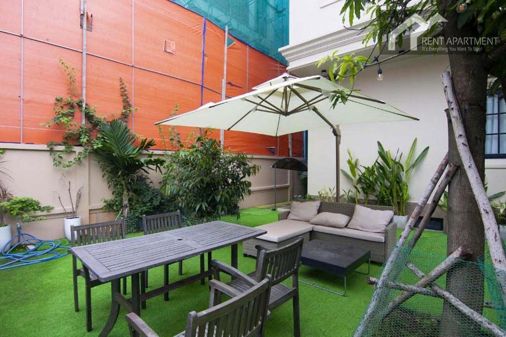 ID 2166 outdoor garden patio with wooden dining table umbrella and sofa lounge