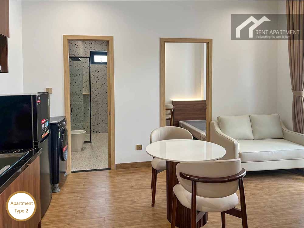 ID 2166 type 2 living area view showing sofa dining set and bathroom entrance