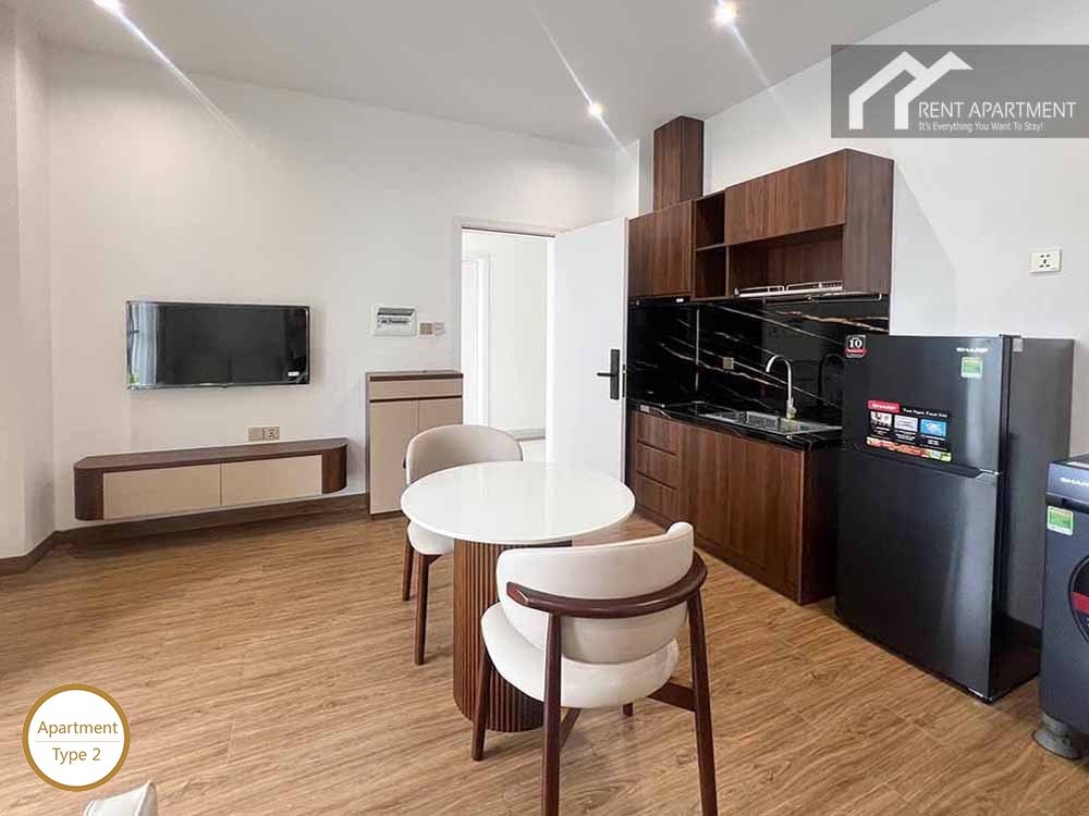 ID 2166 type 2 open plan living space with kitchen counter dining set and wall tv