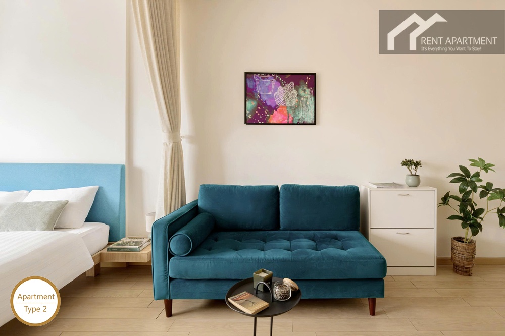 ID 2219 type 2 blue sofa seating area with wall art and cabinet