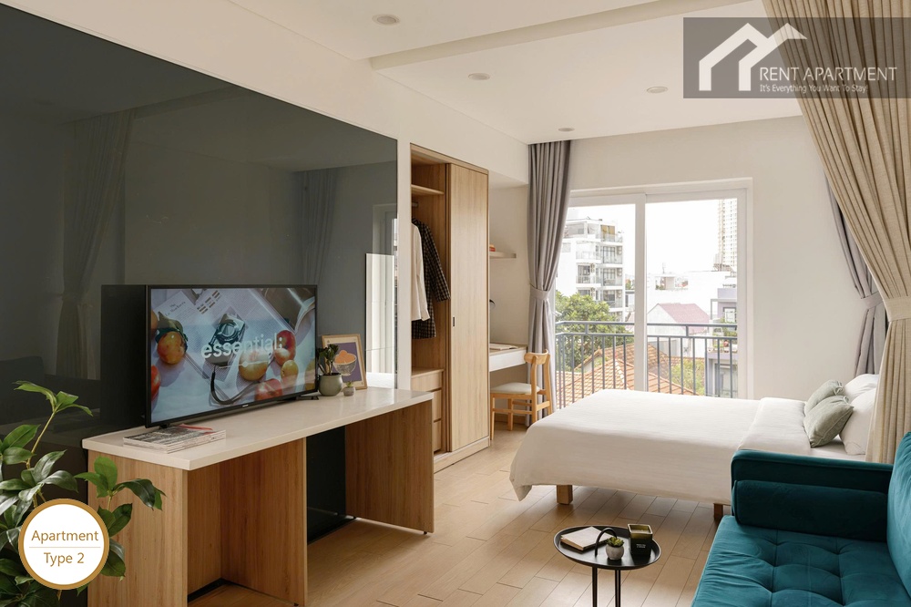 ID 2219 type 2 wide studio interior with bed tv and balcony view