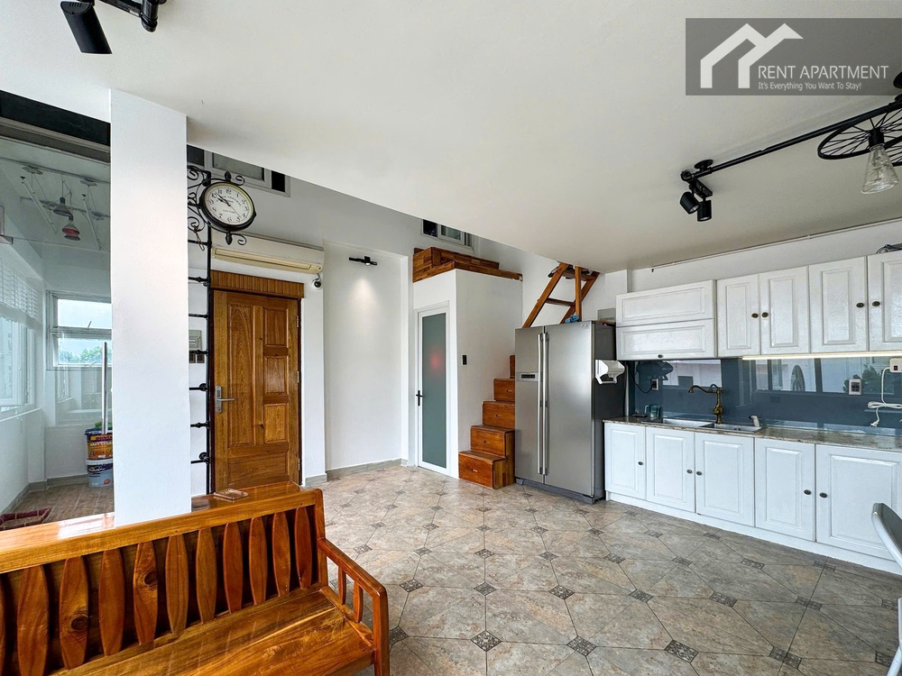 ID 2221 living area with wooden bench entry door and kitchen