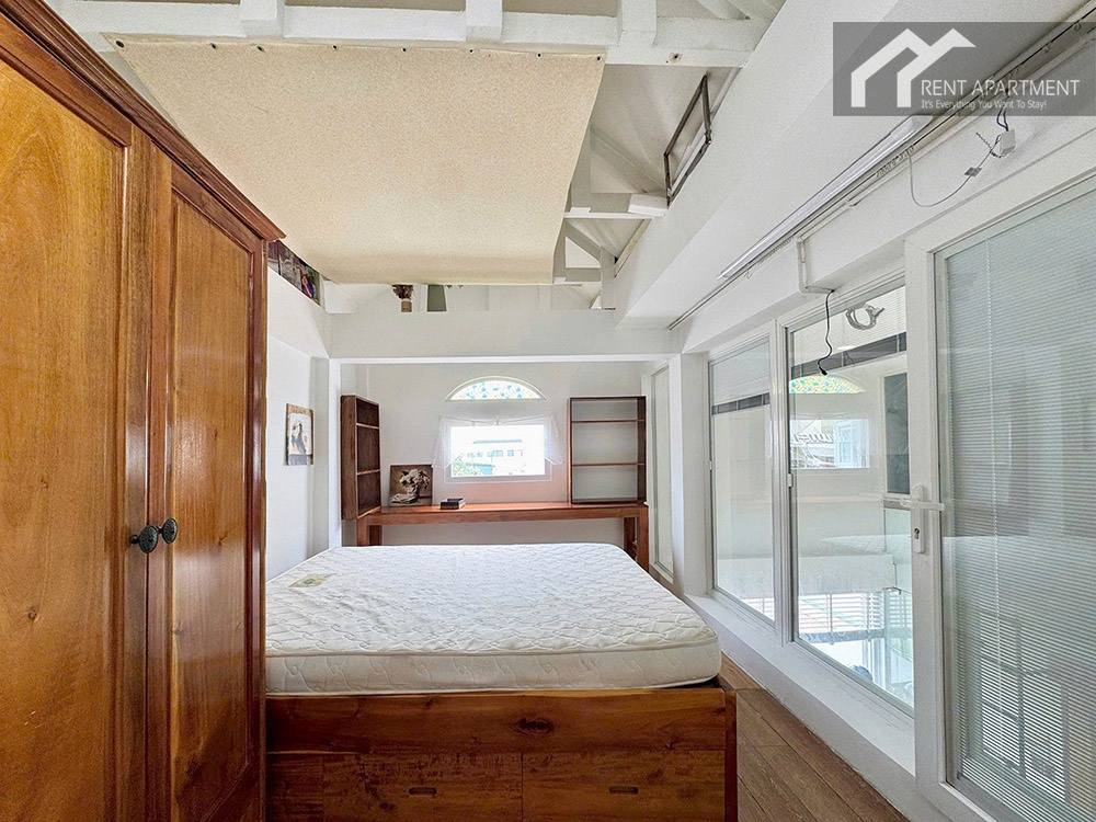 ID 2221 loft bedroom with wooden bed and large wardrobe