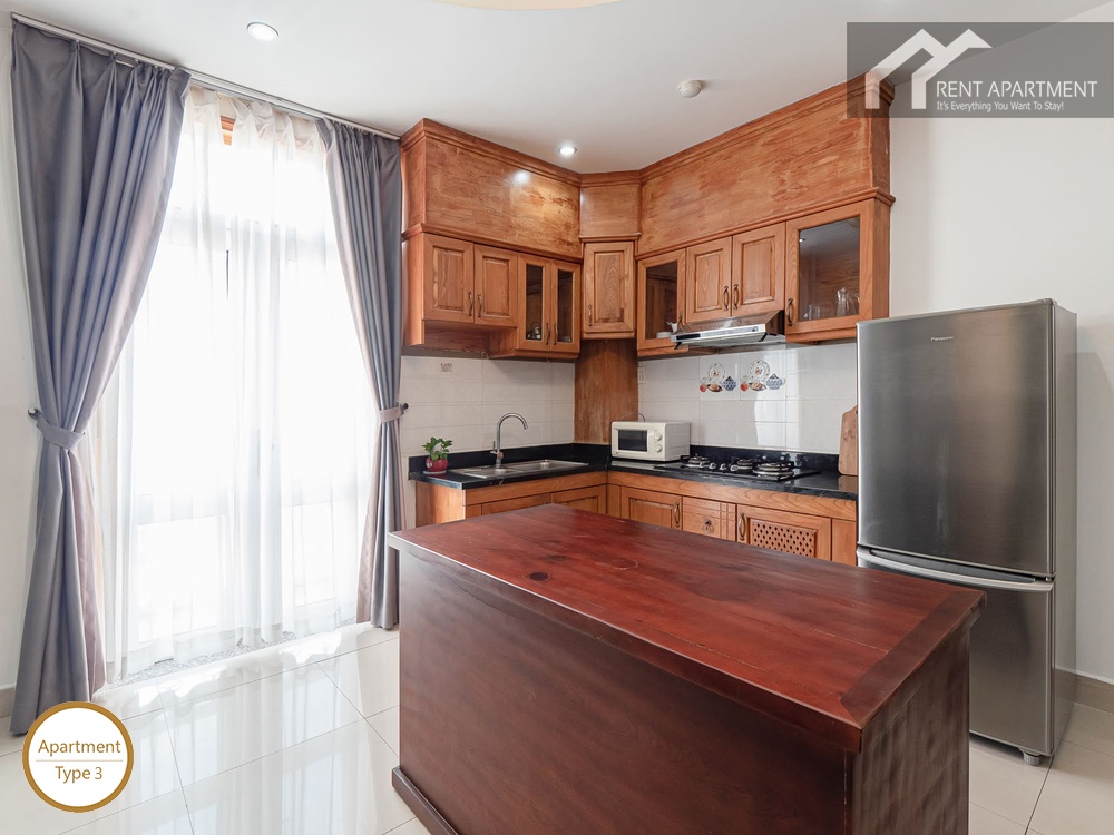 ID 2222 3br fully equipped kitchen with wooden cabinets and island