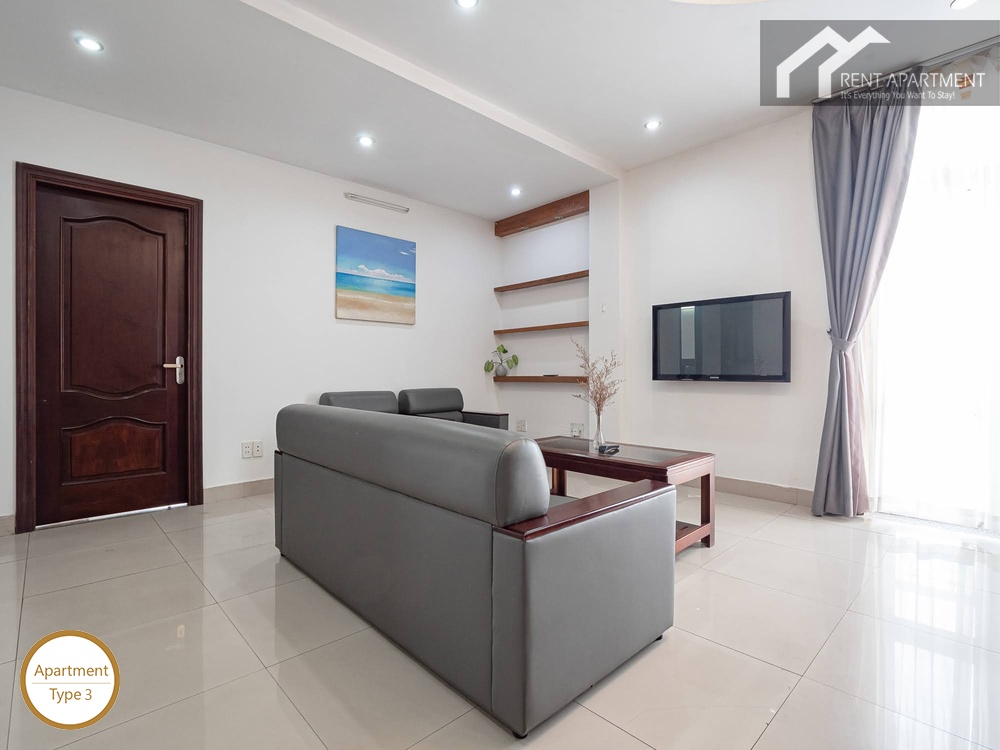ID 2222 3br living room tv area with grey sofa and curtain