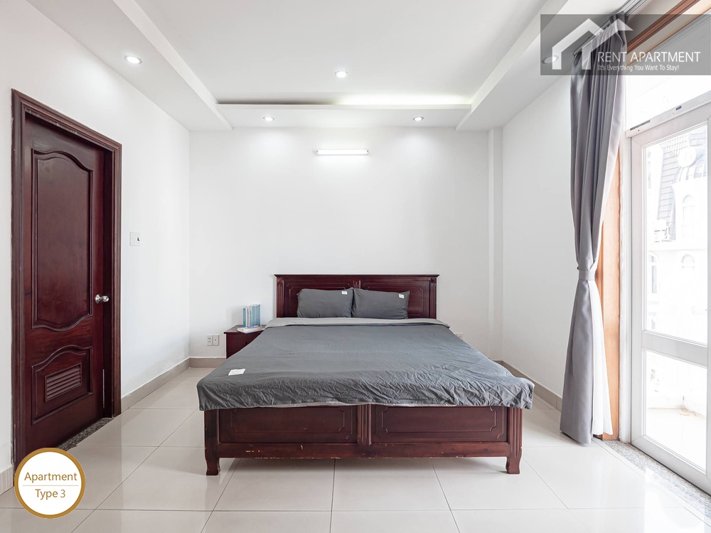 ID 2222 3br master bedroom front view with double bed and balcony door