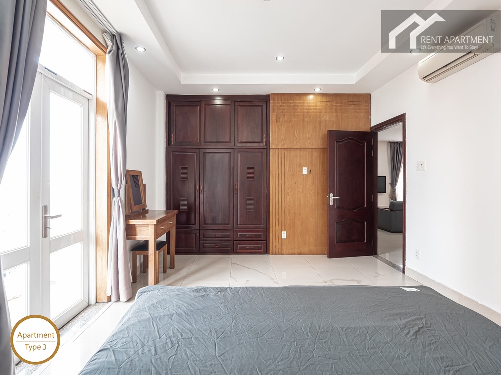 ID 2222 3br master bedroom with wooden wardrobe and balcony exit