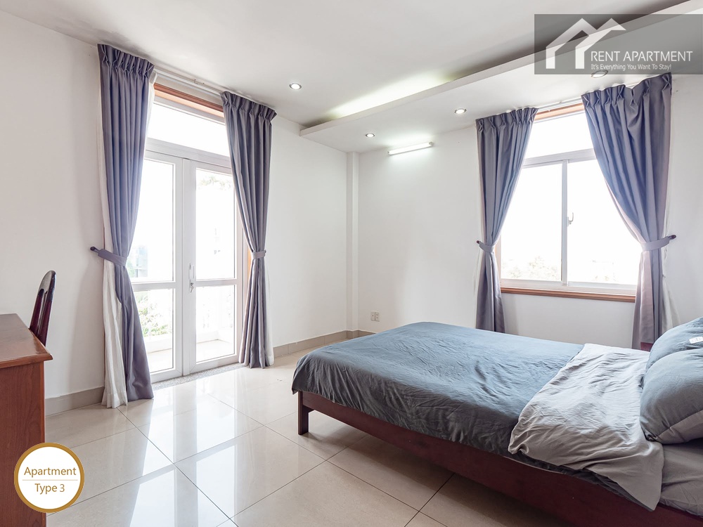 ID 2222 3br second bedroom with double bed and large windows