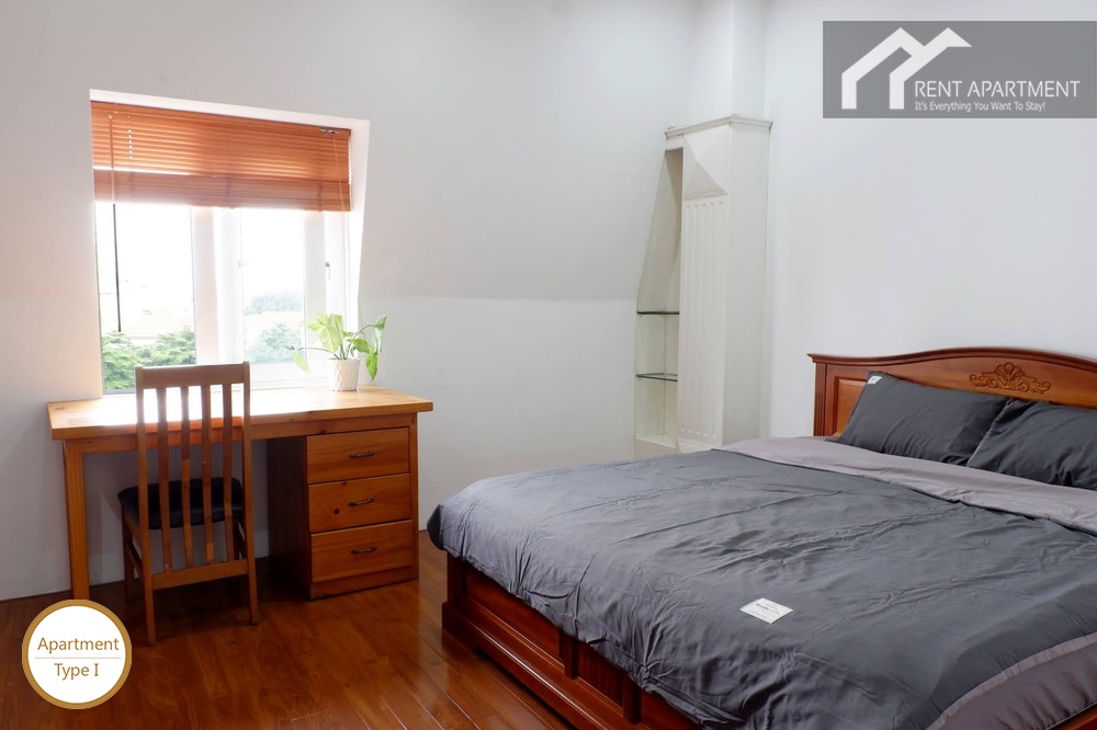 ID 2222 bedroom with wooden bed and work desk near window