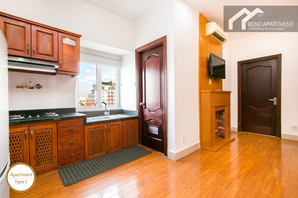 ID 2222 kitchen area with wooden cabinets and sink near window