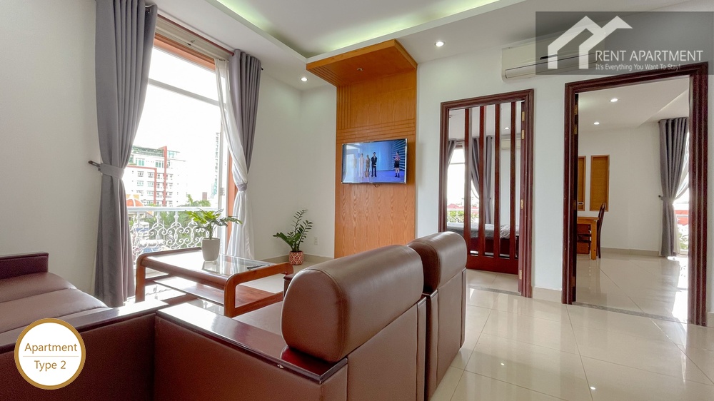 ID 2222 living room seating near balcony doors and curtains