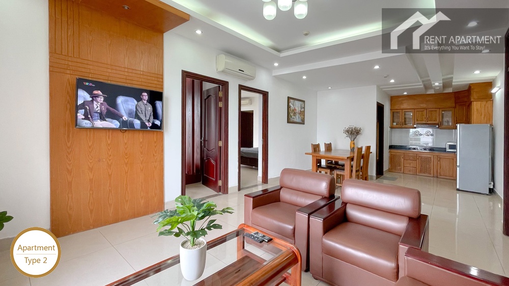 ID 2222 living room with wall mounted tv leather armchairs and dining table