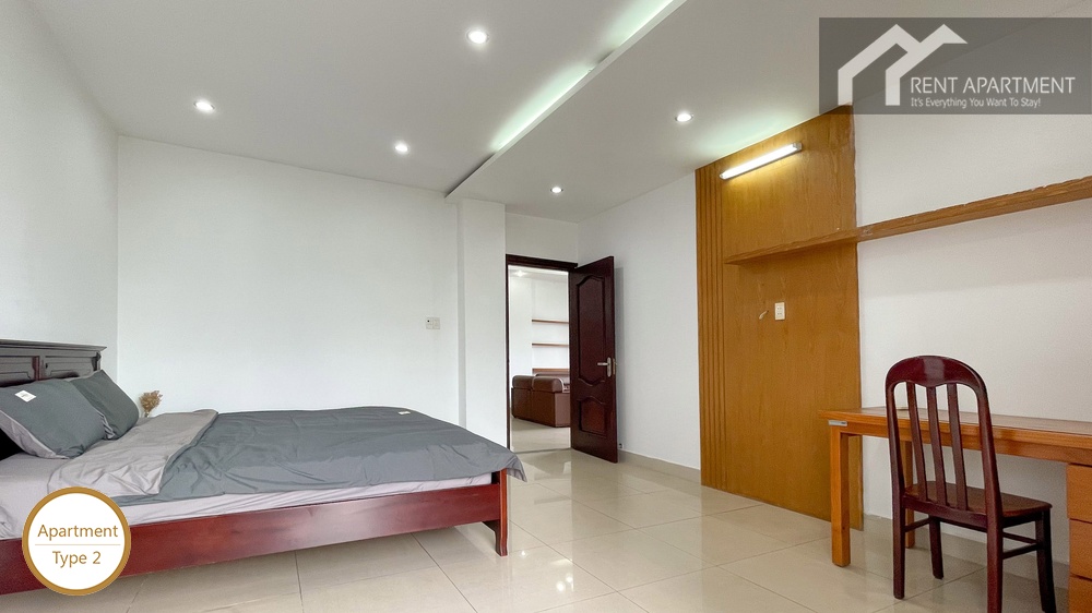 ID 2222 second bedroom with wooden bed and study desk