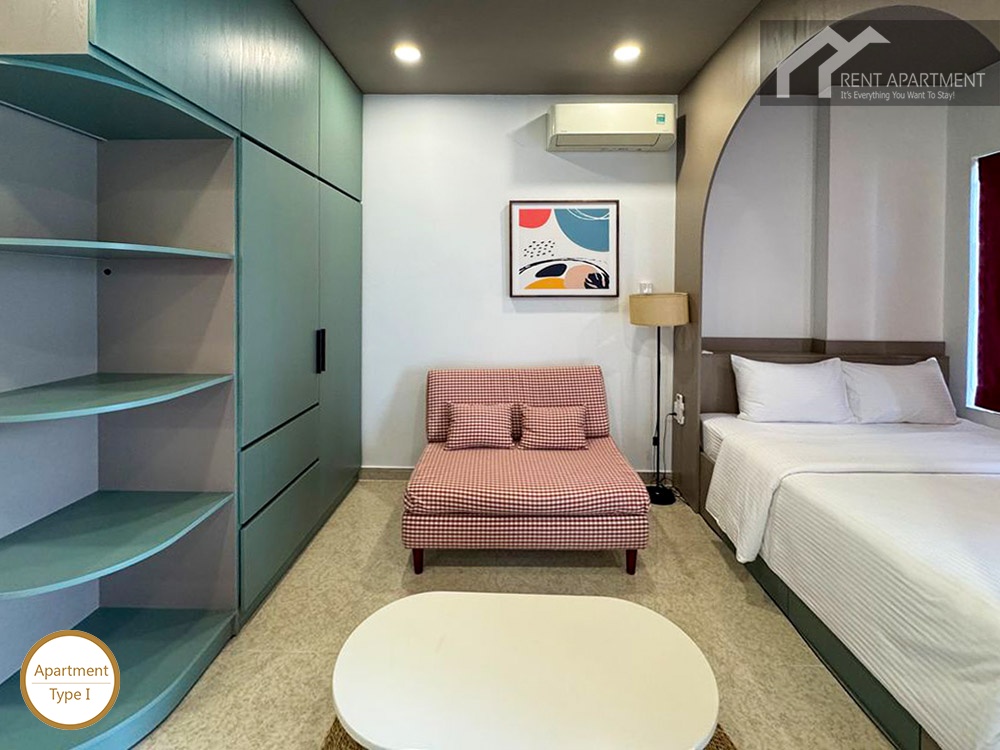 ID 2224 studio bedroom area with arch bed alcove and lounge chair