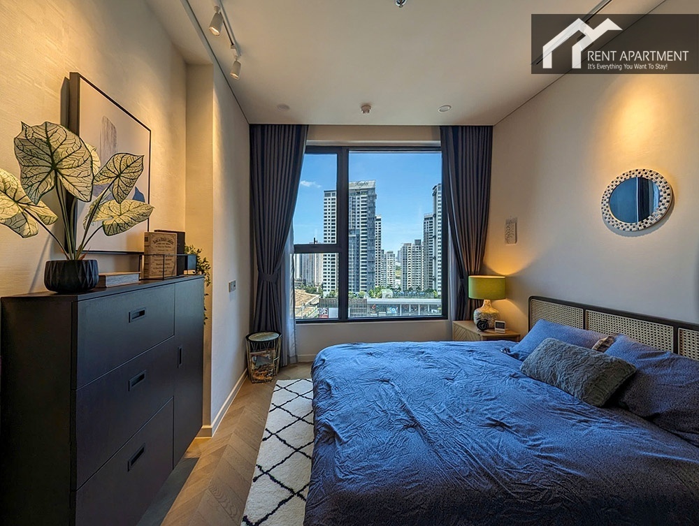 ID 2225 bedroom with blue bedding chest of drawers and city view window