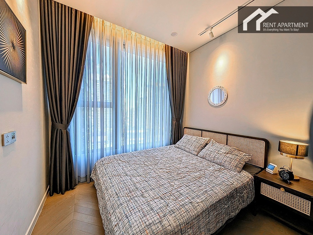 ID 2225 cozy bedroom with rattan headboard checkered bedding and nightstand