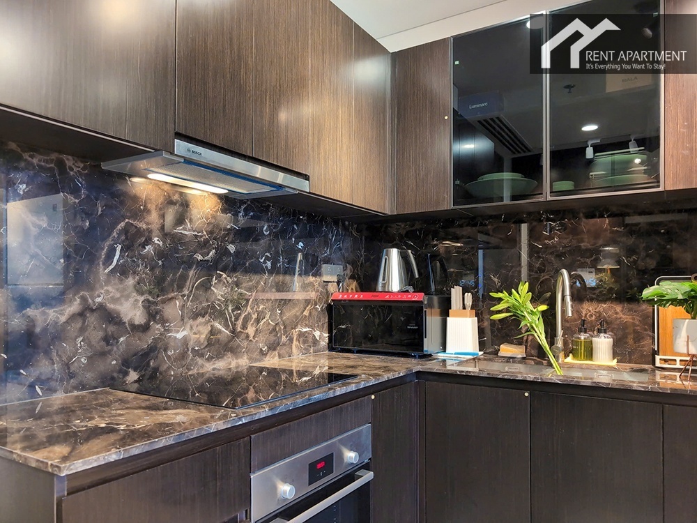 ID 2225 dark wood kitchen with marble countertop oven and cooktop