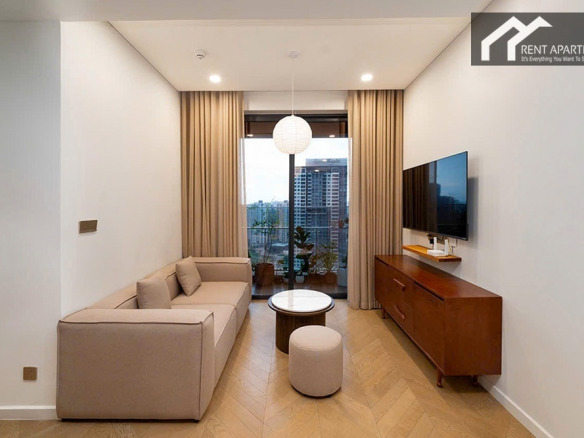 ID 2227 cozy living room with sofa tv credenza and balcony window