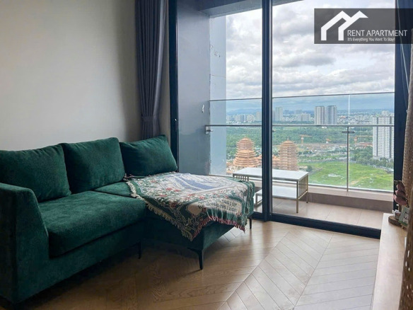 ID 2228 green sofa with balcony door and city views