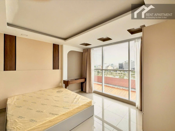 ID 2230 bedroom with large floor to ceiling window river view and vanity desk