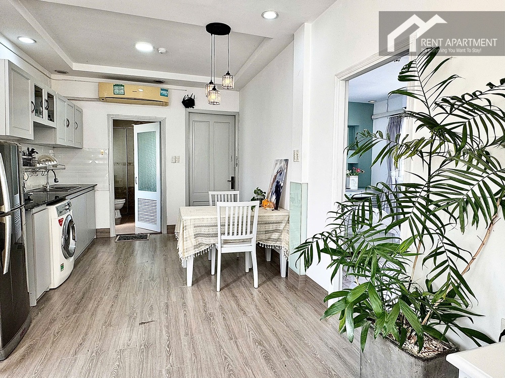 ID 2231 kitchen and dining area with table washing machine and plant