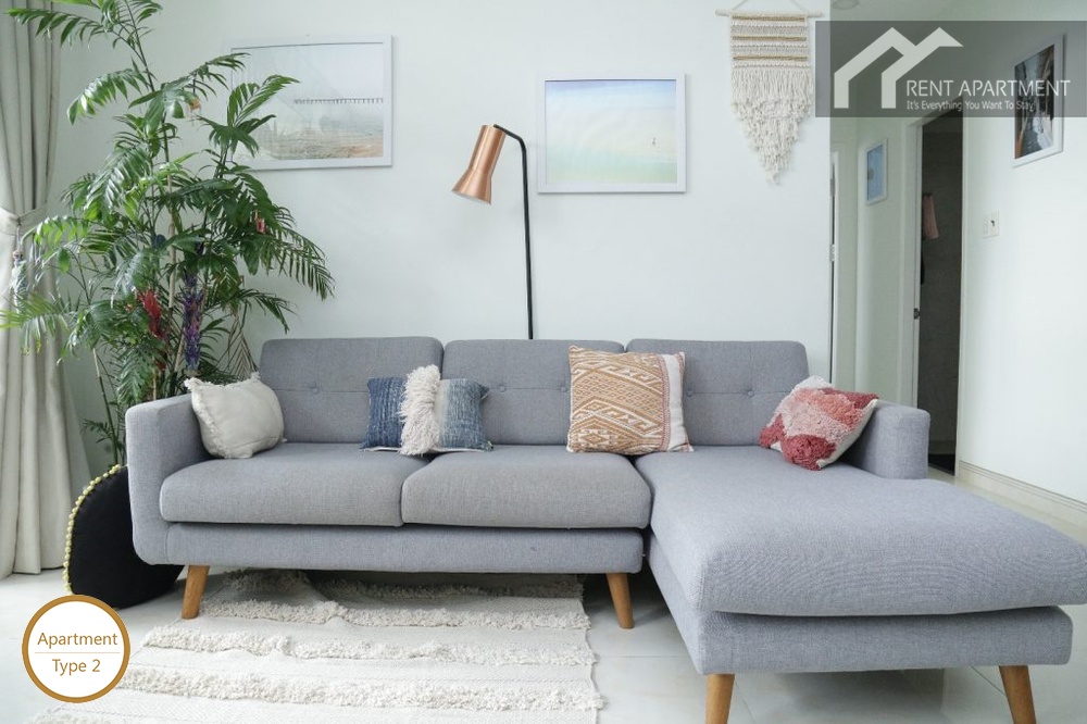 ID 2234 2br living room with grey sectional sofa and floor lamp