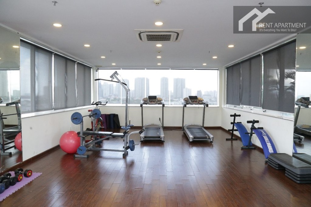 ID 2234 gym room with treadmills and city view windows