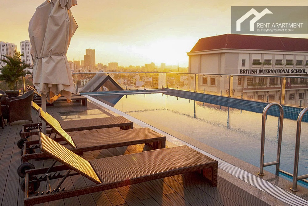 ID 2234 rooftop swimming pool deck chairs at sunset