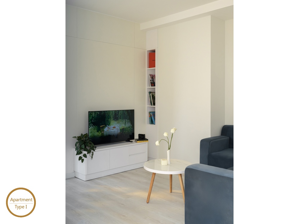 ID 2235 1br living area with tv console and sofa