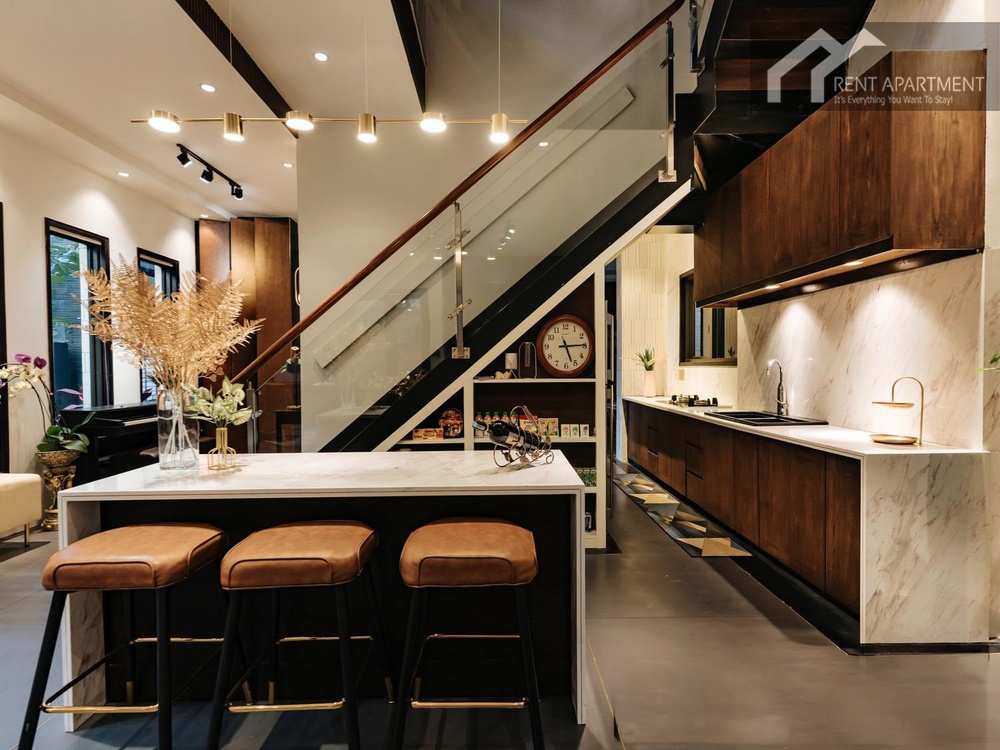ID 2237 The open 2+1 kitchen installed Haffele cooking equipments is made from bronzy marble stone and oak wood