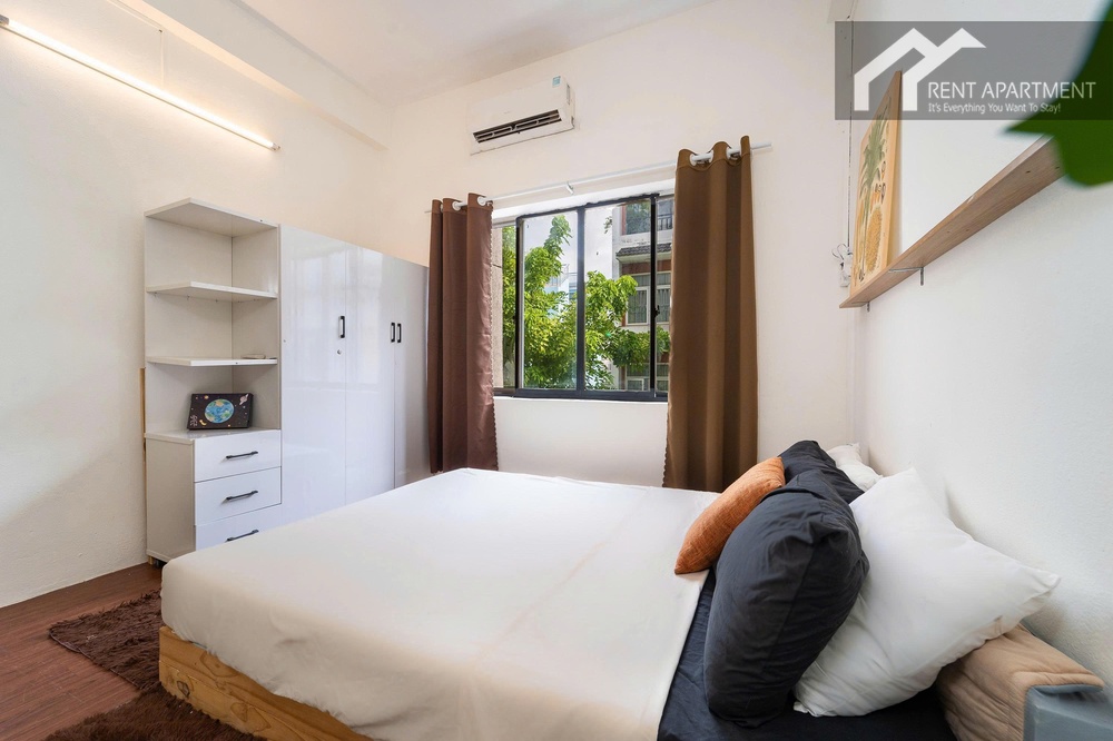 ID 2238 bedroom side view with double bed white wardrobe and window