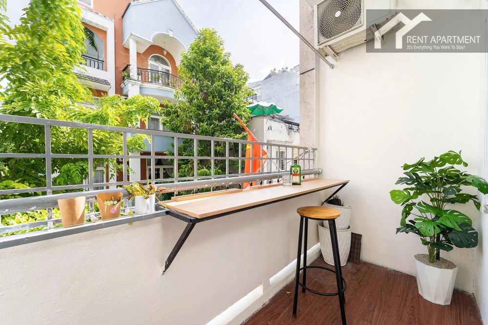 ID 2238 outdoor balcony with wooden bar counter stool and plant