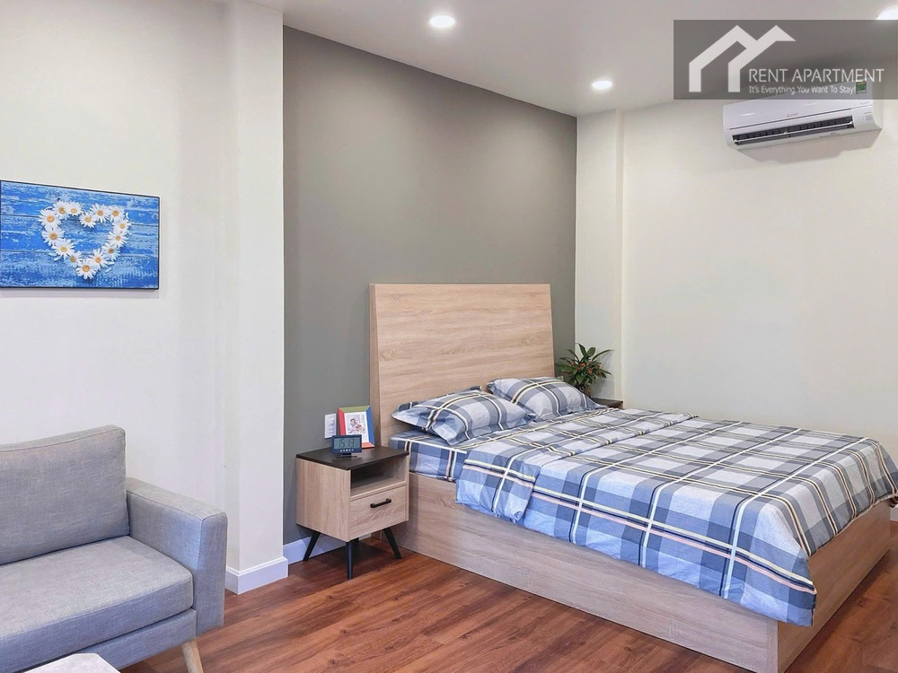 ID 2239 bedroom area with wooden double bed and air conditioner