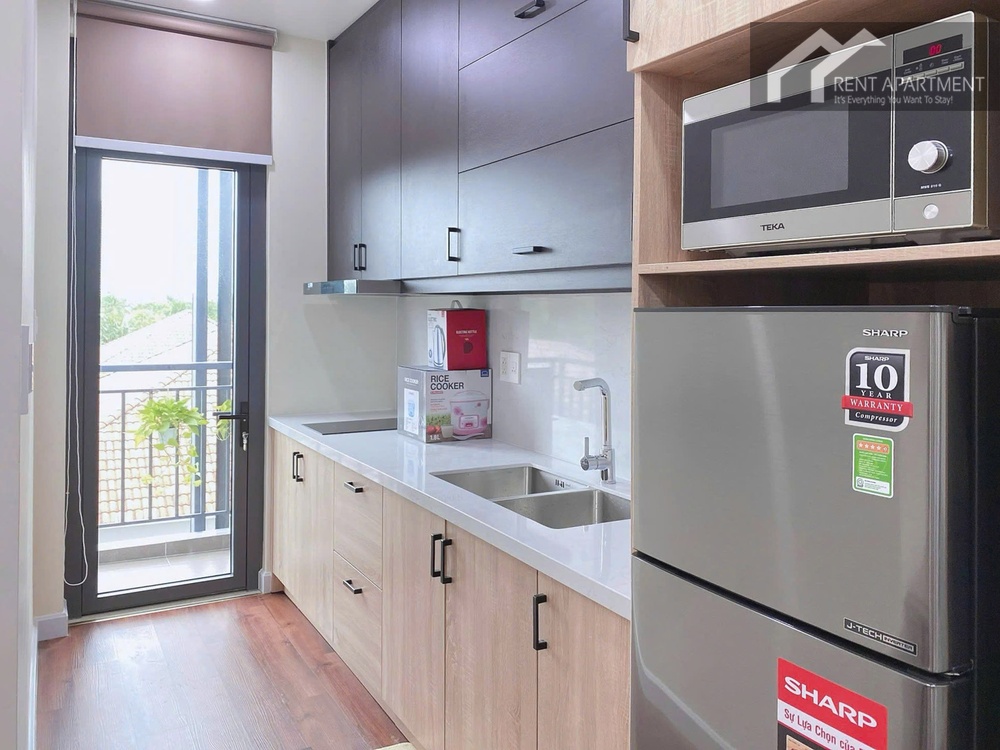 ID 2239 kitchen cabinets with refrigerator microwave and balcony door