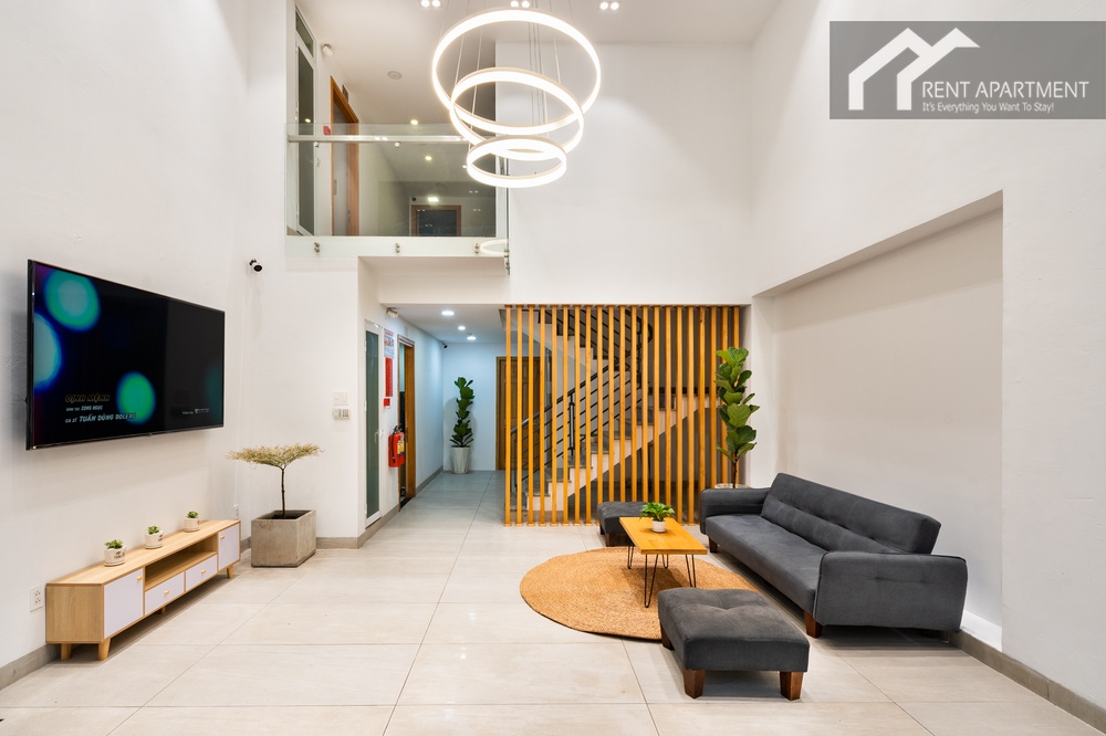 ID 2240 building ground floor lobby seating area with sofa and tv
