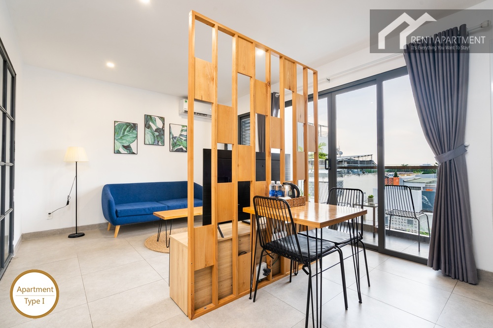 ID 2240 type 1 dining table with slatted wooden screen and balcony entrance