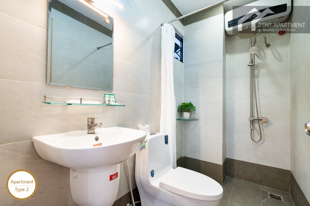 ID 2240 type 2 bright bathroom with pedestal sink toilet and shower area