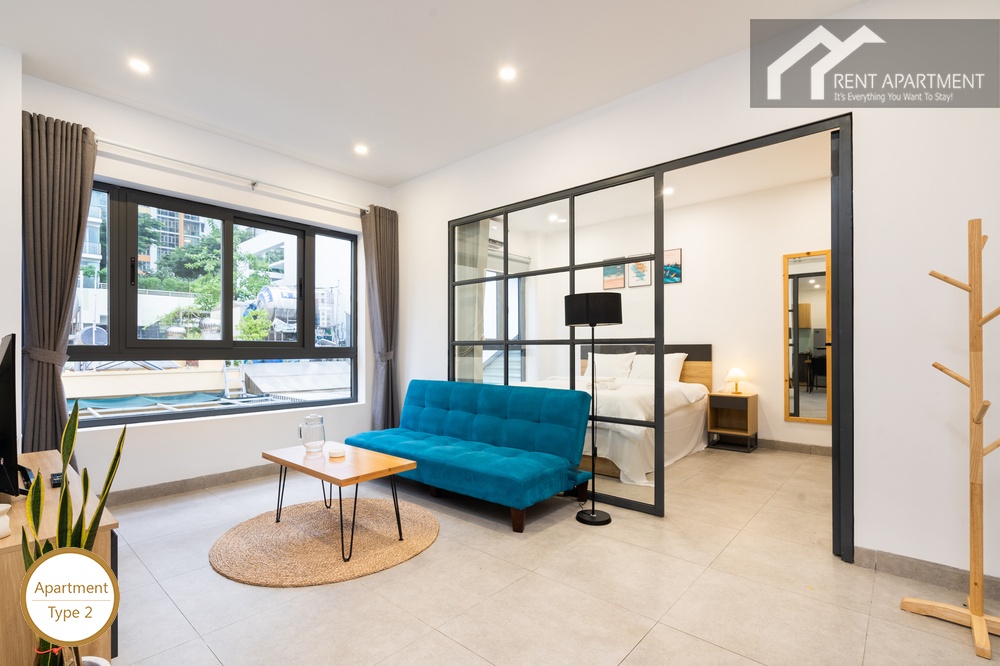ID 2240 type 2 living room with blue futon and glass frame bedroom partition